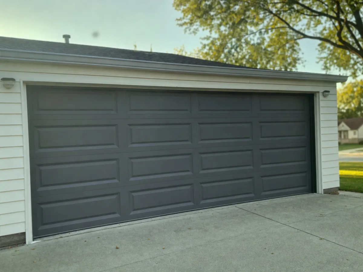Newly installed garage door viewed from inside the garage — completed job in Cleveland, OH