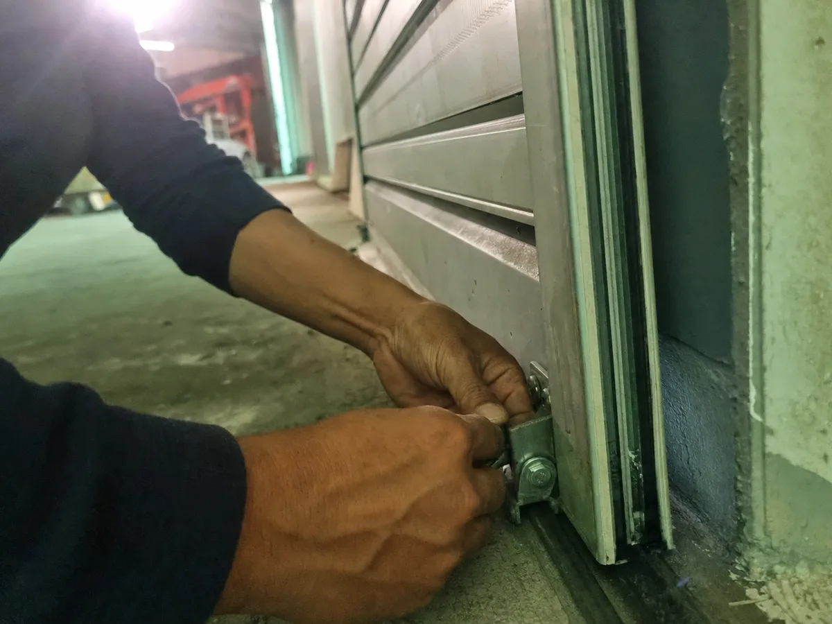 garage door repair technician on the job in Cleveland, OH